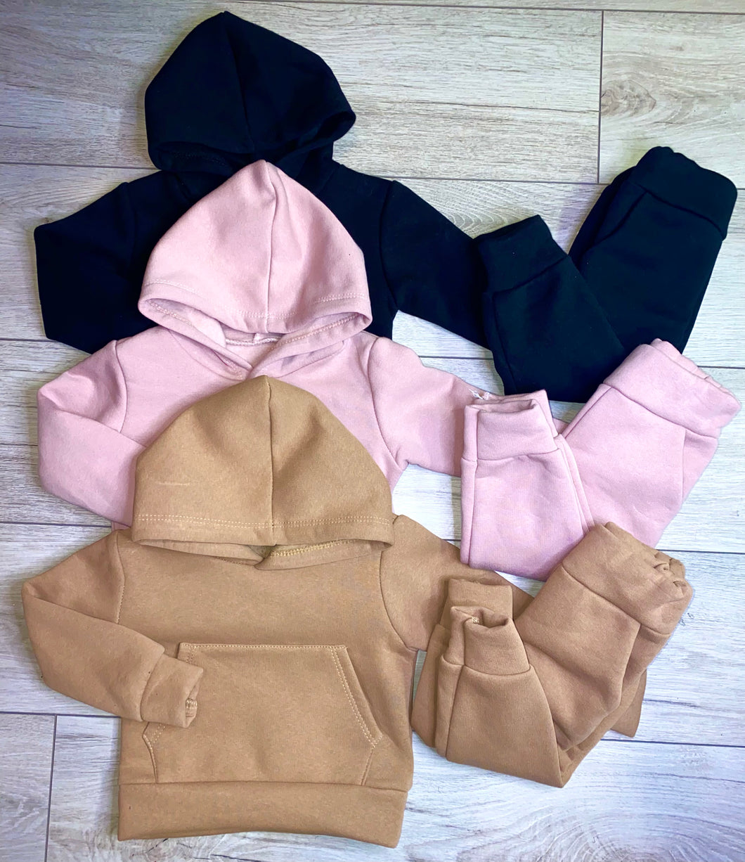 Hooded fur lined tracksuits