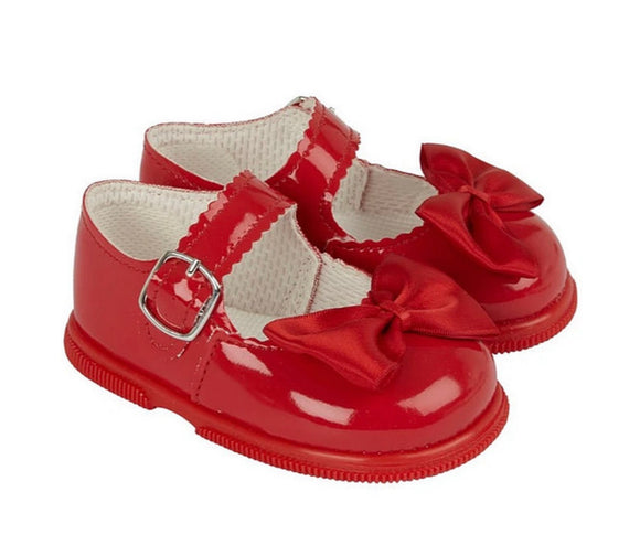 Red hard soled shoes