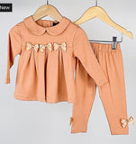 Peach bow leggings